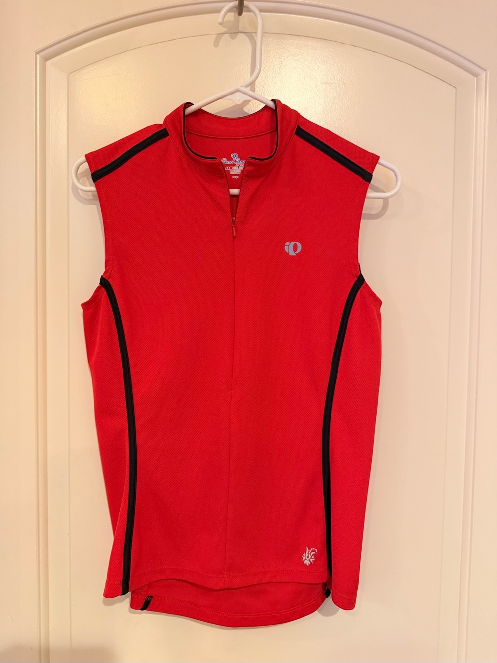 Pearl Izumi select Women’s cycling jersey size Large Red with Black trim.